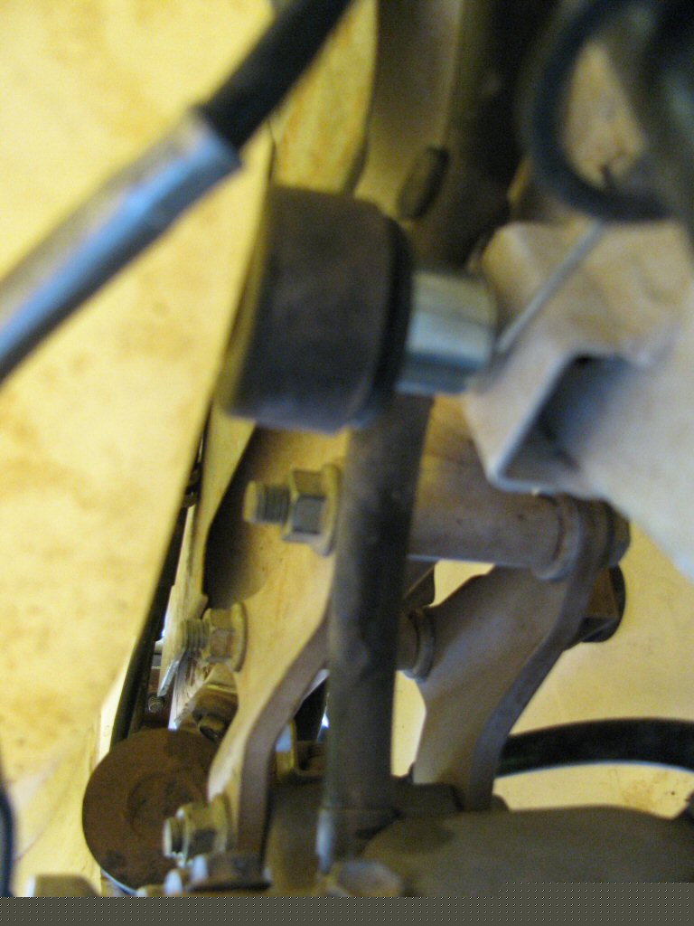Clarke tank on my 1993 Suzuki DR350. A bit blurry, but this shows the bumper in place and making contact with the tank.