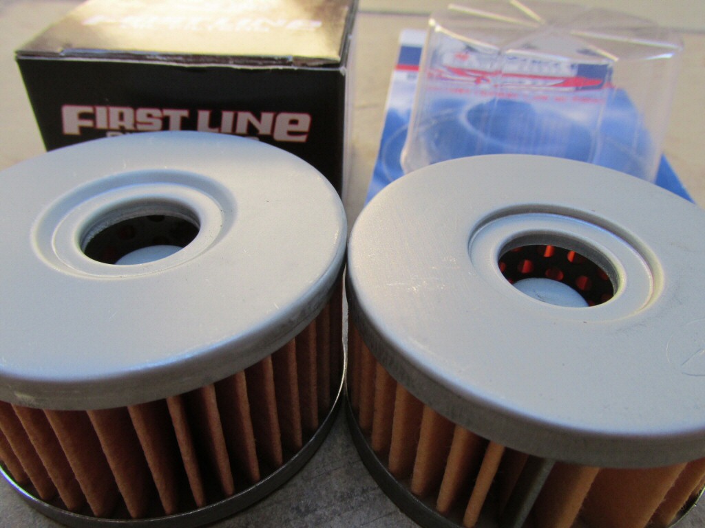 Tusk filter on left: depression measures ~1.6 mm in depth; Suzuki filter on right: depression measures ~1.9 mm in depth. In my experience, the shallower depth and more gradual corners of the Tusk depression may contribute to the small O-ring being displaced, thus compromising the seal.
