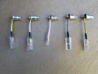 The 5 single terminal bulb holders used on loop frame models with a single gauge police dash. Sold each.