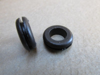 Set of two grommets to fit the holes in the voltage regulator bracket for Bosch voltage regulators.