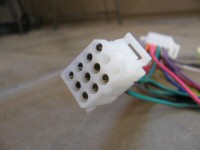 12 terminal connection that fits into the headlight shell.