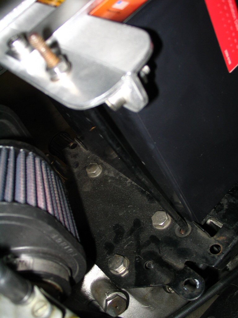 View of the left side L-shaped bolt in the standard position using the standard holes. Applicable to Moto Guzzi V700, V7 Special, Ambassador, 850 GT, 850 GT California, Eldorado, and 850 California Police motorcycles.