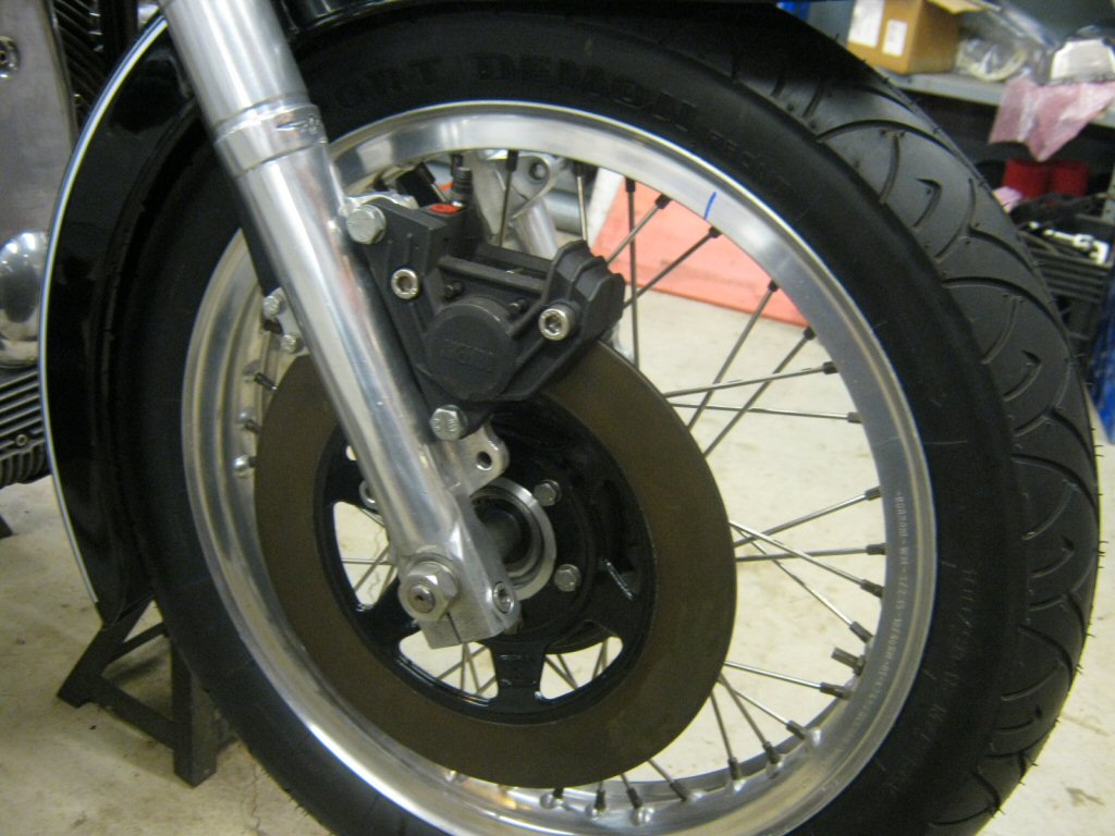 Disc brake spacer as used to fit a disc brake to drum brake Moto Guzzi V700, V7 Special, Ambassador, 850 GT, 850 GT California, Eldorado, and 850 California Police motorcycles.Spacer made by Steve Odell.