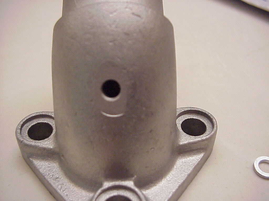 Intake manifolds modified to support vacuum balancing.