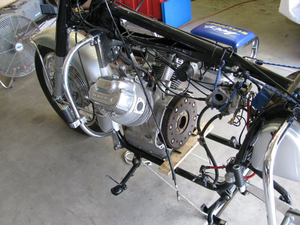 Rear of engine supported with a board.
