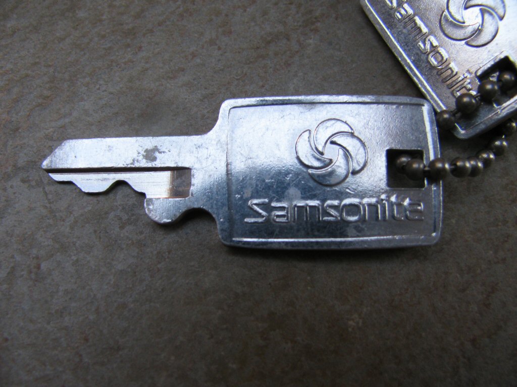 Key to open latches on luggage. Seems to be universal with regard to all Samsonite motorcycle luggage.