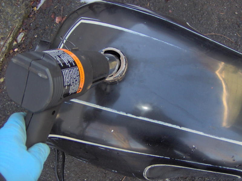 Drying the tank. Drained the alcohol, then used the heat gun on low to dry the insides.