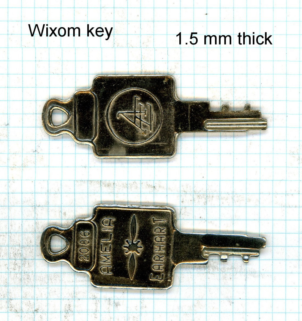 Detail of an Amelia Earheart key on grid paper. Amelia Earheart was a manufacturer of luggage and the keys they used just happen to work in the latches used on the Wixom saddlebags.