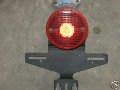 Tail light round, Moto Guzzi photo archive of parts