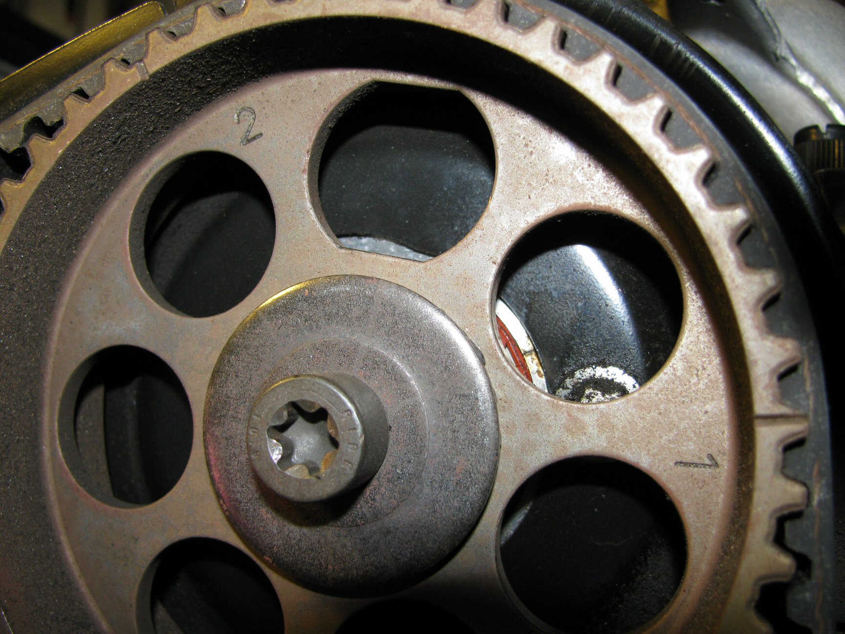 Camshaft pulley 2 aligned with notch in backing tin.