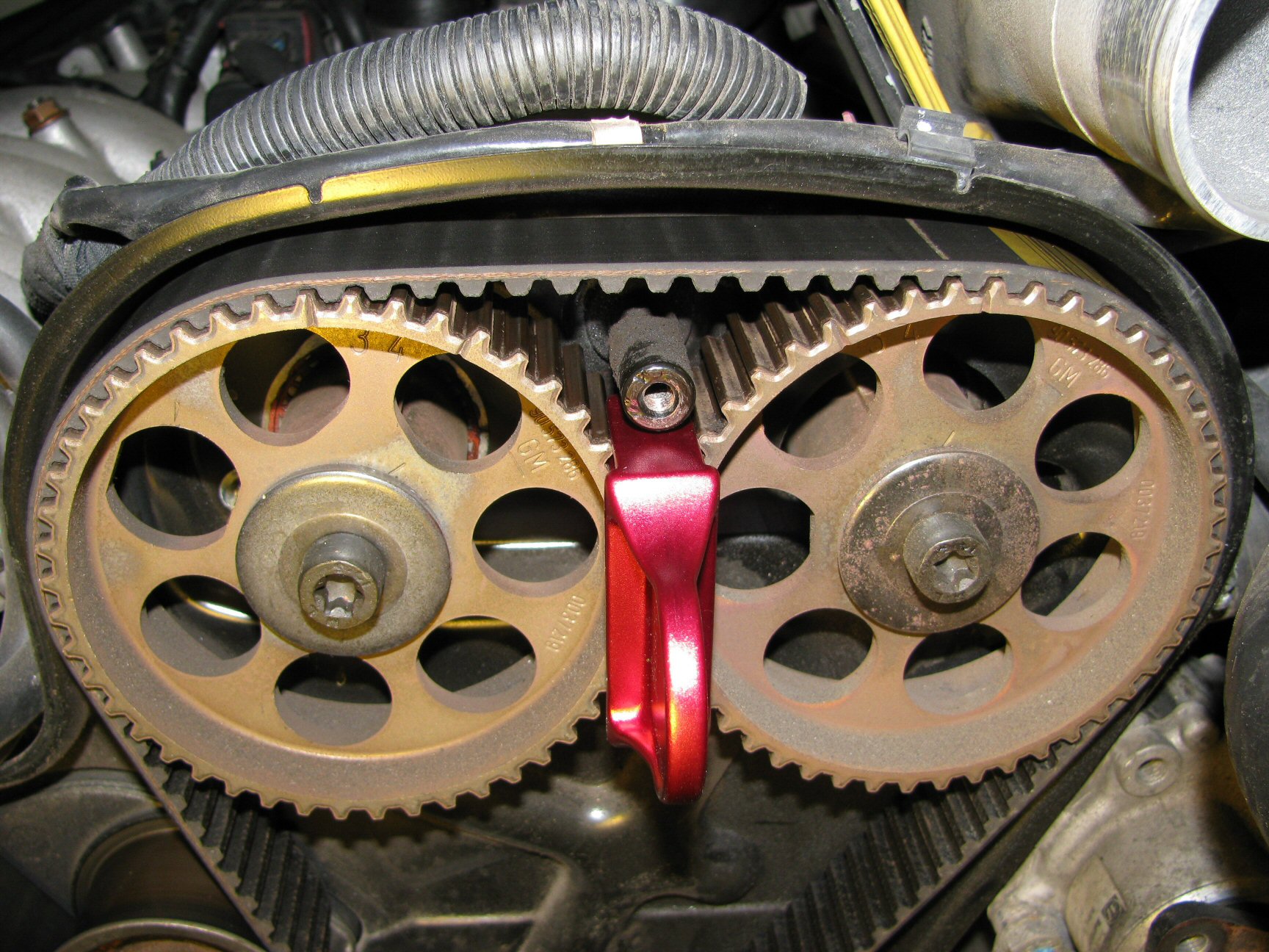 Camshaft pulleys 3 (left) and 4 (right).
