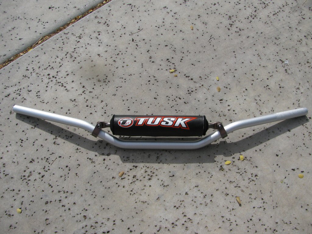 Tusk T-10 Aluminum, CR Mid Bend handlebars.