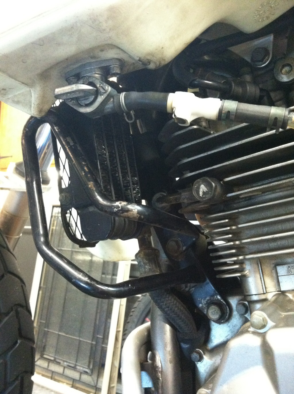Original oil cooler installed on a Suzuki DR350.