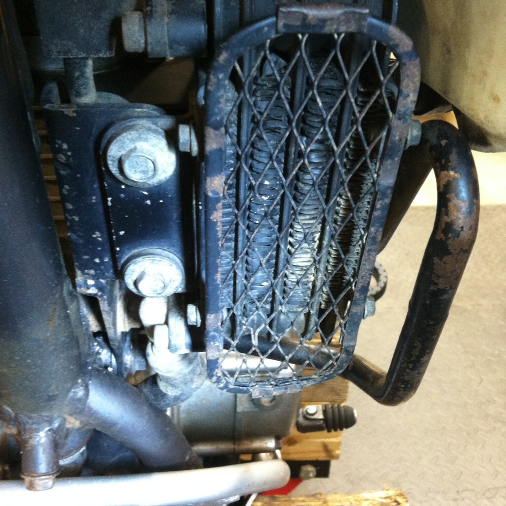 Original oil cooler installed on a Suzuki DR350.