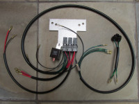 The complete bracket and wiring harness you will receive.