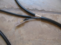 This wire connects to the existing horn ground wire.