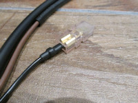 This wire connects to the existing horn ground wire.