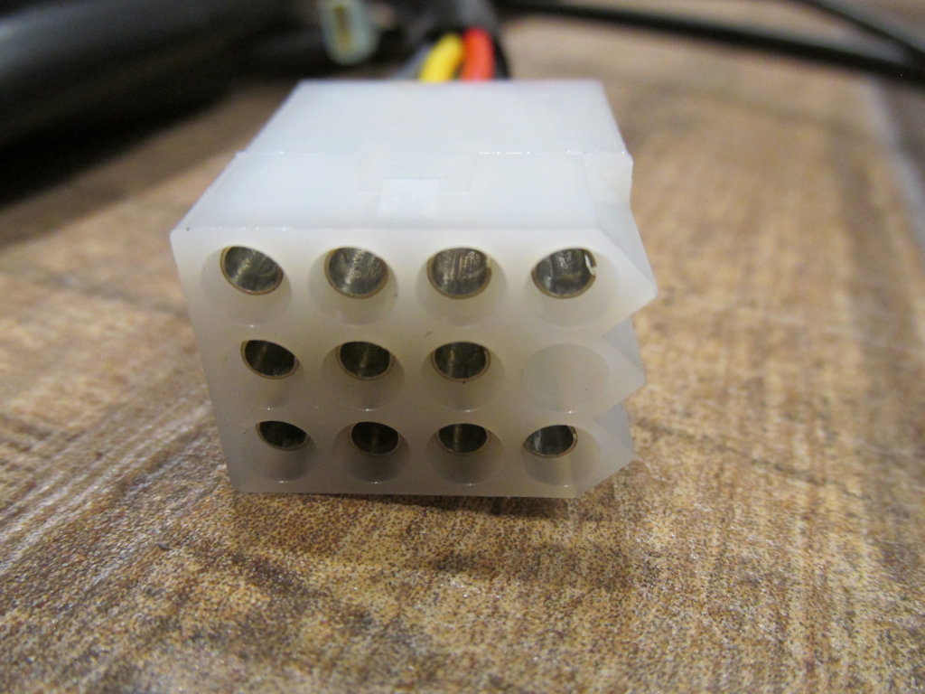 12 terminal connection that connects to the left handlebar switch sub-harness.