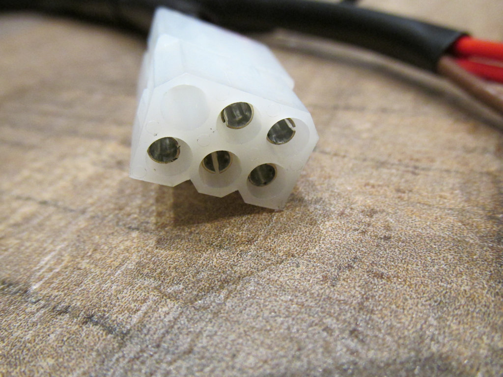 6 terminal connection that connects to the tail light and rear turn signals.