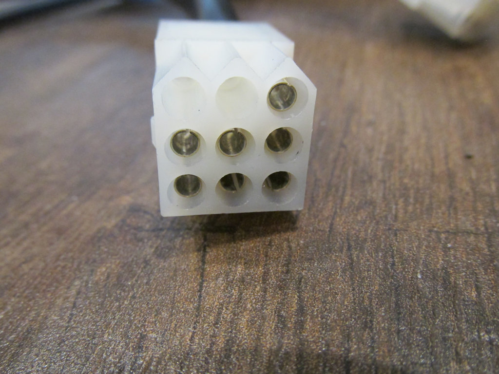 9 terminal connection that connects to the left handlebar switch sub-harness.