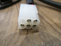 6 terminal connection that connects to the tail light and rear turn signals.