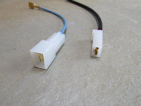 These two wires connect to the main harness. Each must be inserted into the original Saprisa plug.
