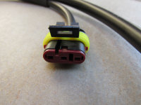 3-pin AMP Superseal connector.
