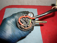 Fitment of flag terminals to the ignition switch.