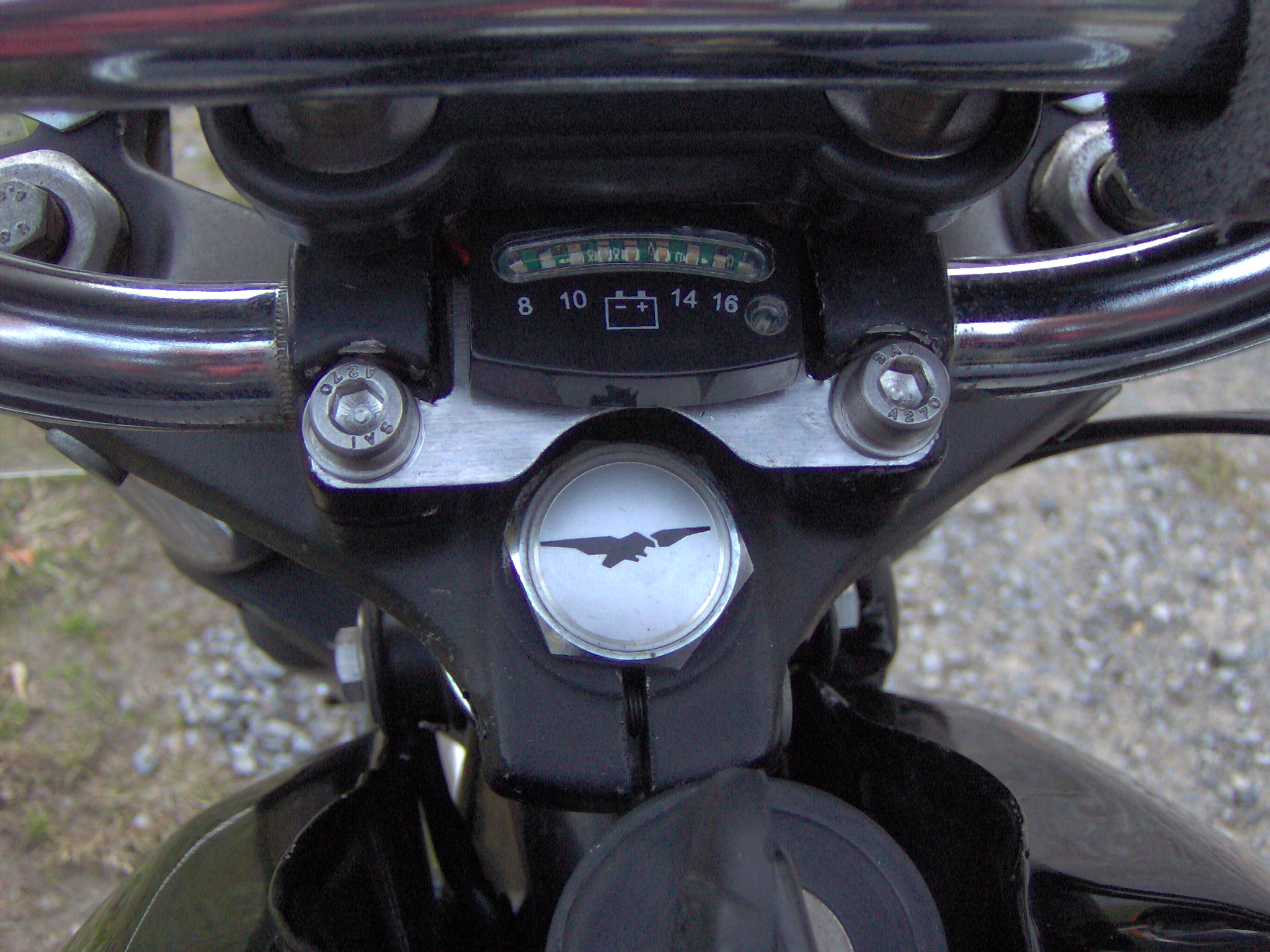 Kuryakyn battery gauge mounted on a Moto Guzzi I-Convert.