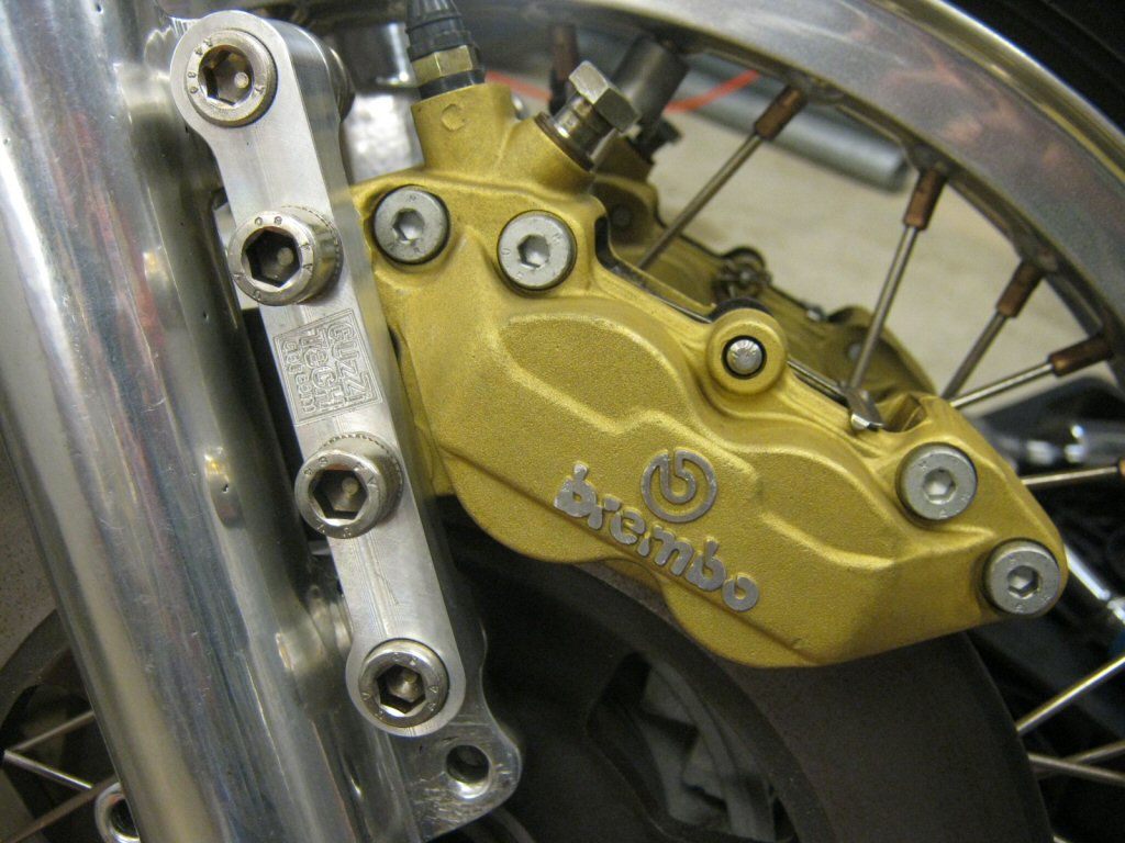 Brembo F08 to 4 piston caliper conversion with 40 mm mount spacing fitment on a Moto Guzzi Eldorado (Guzzi Power adapter).