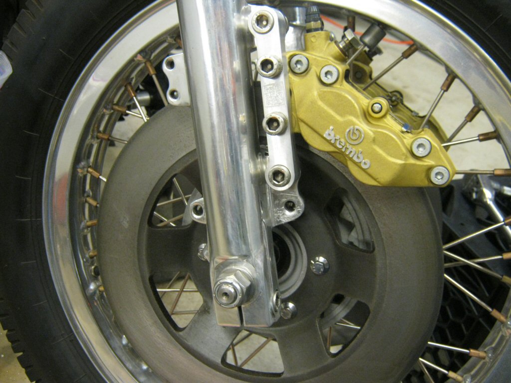 Brembo F08 to 4 piston caliper conversion with 40 mm mount spacing fitment on a Moto Guzzi Eldorado (Guzzi Power adapter).