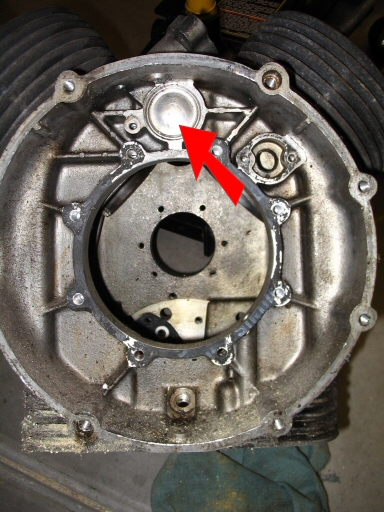Location of cam plug within the bell housing.