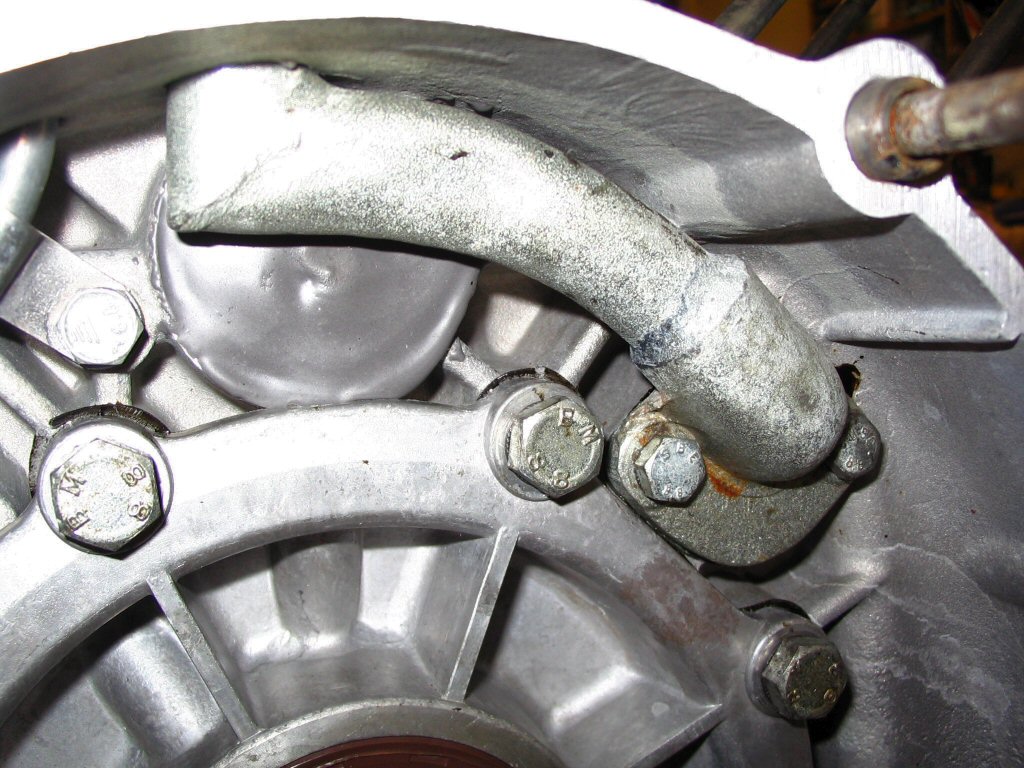 Cam plug that has been sealed with J-B WELD.