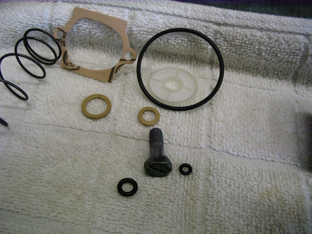 Select the smallest of the fiber washers.