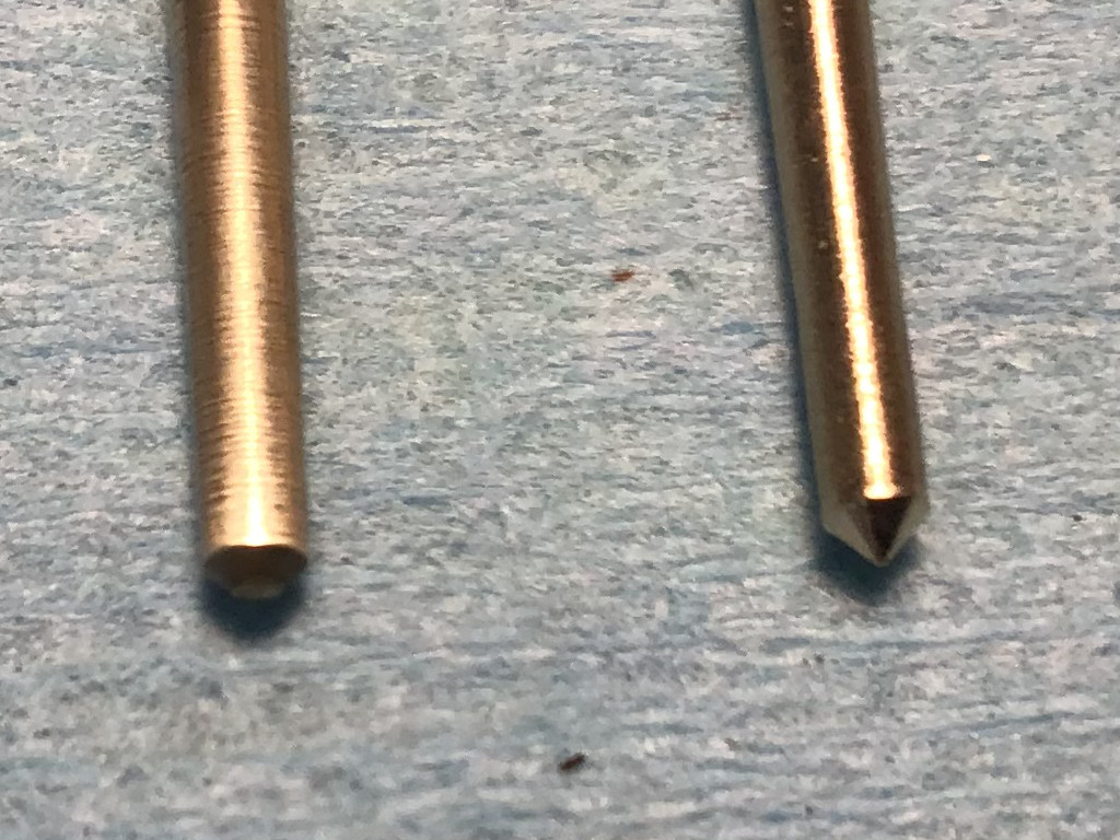 Always inspect your needle for wear. Notice the worn down tip of the old one on the left from years of pushing down the spring on the accelerator pump vs the pointed tip on the new one on the right. Both are V-5 needles.