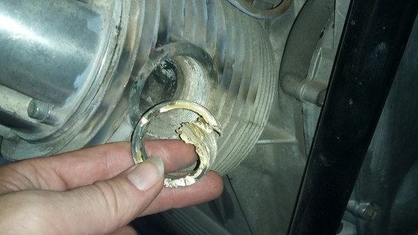 Here is a picture of the partially collapsed exhaust nut after I removed it from the head.