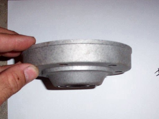 Disc brake hub flange / bearing carrier (non-disc side) for Moto Guzzi 850 GT, 850 GT California, Eldorado, and 850 California Police motorcycles fitted with a disc front brake.