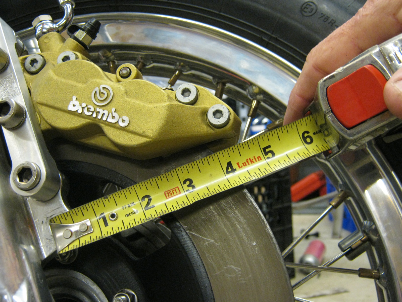 Disc brake configuration using 4 piston calipers. Applicable to Moto Guzzi V700, V7 Special, Ambassador, 850 GT, 850 GT California, Eldorado, and 850 California Police models.