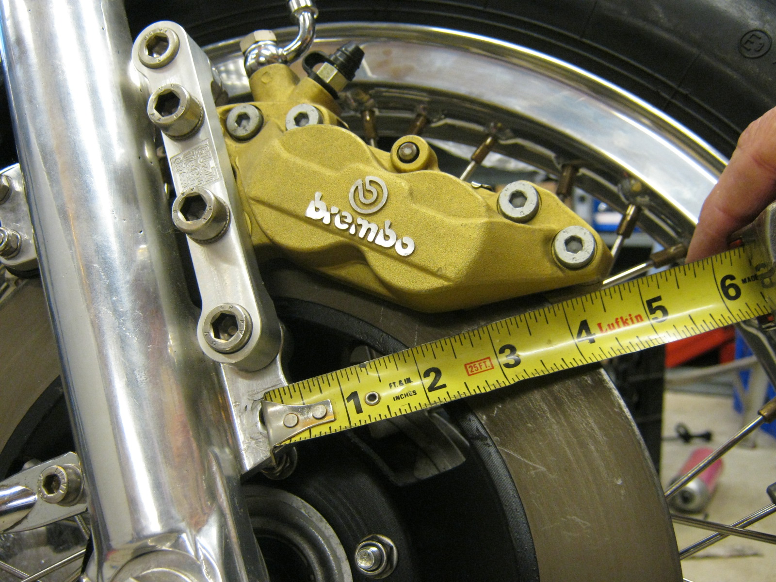 Disc brake configuration using 4 piston calipers. Applicable to Moto Guzzi V700, V7 Special, Ambassador, 850 GT, 850 GT California, Eldorado, and 850 California Police models.