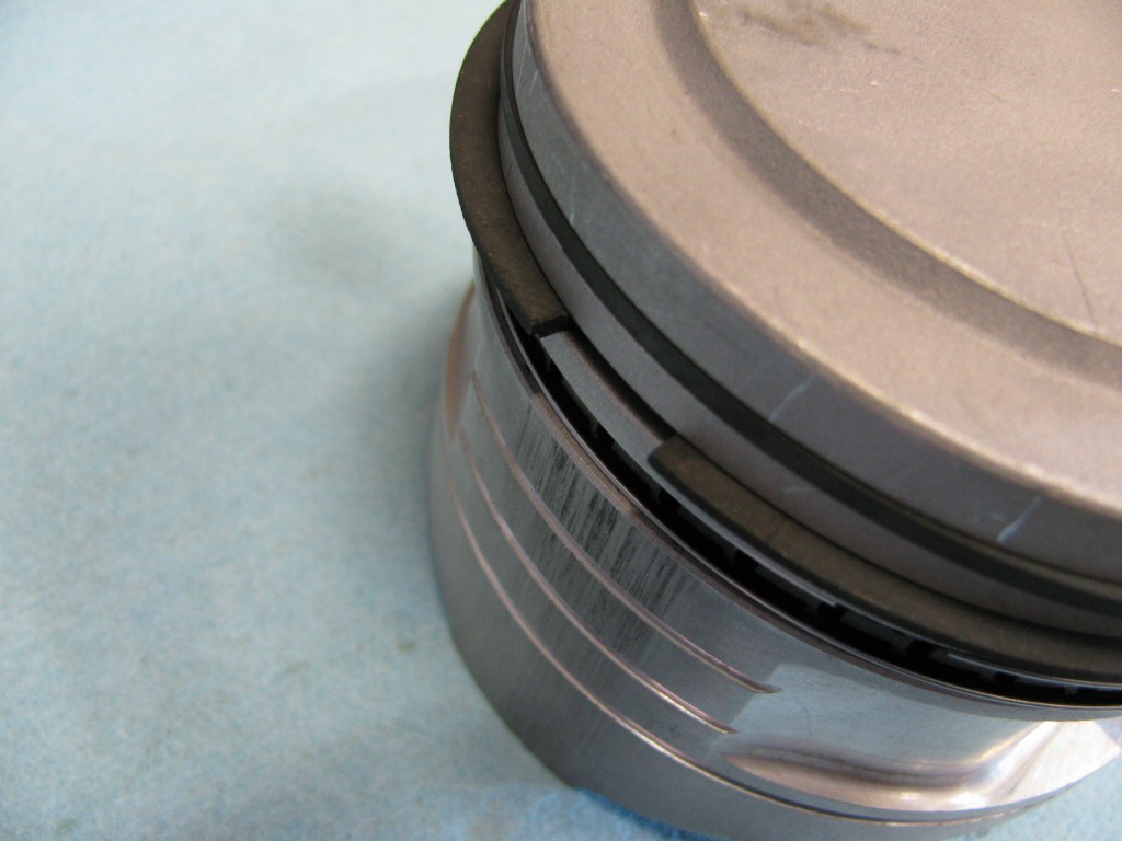 Rings fit to the right piston. This series of photos is intended to show the careful ring gap placement, as per the instructions provided by the piston ring manufacturer (TotalSeal).