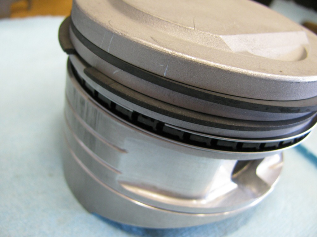 Rings fit to the right piston. This series of photos is intended to show the careful ring gap placement, as per the instructions provided by the piston ring manufacturer (TotalSeal).