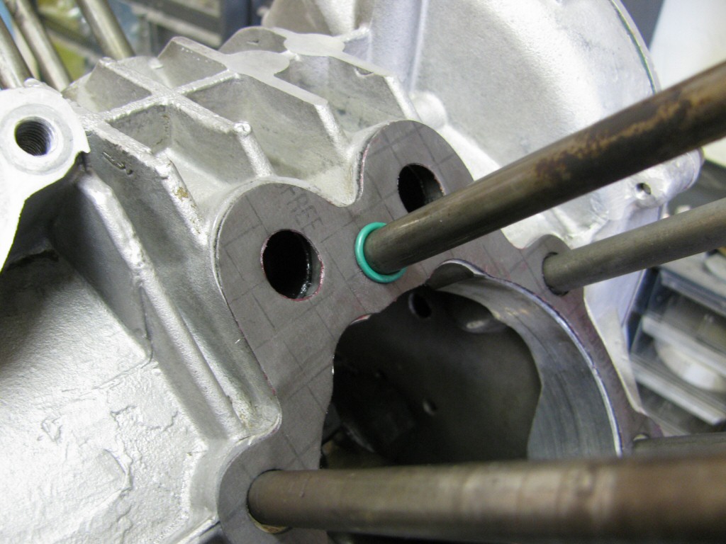 An O-ring is placed on the top-most stud (the 12 o'clock stud).