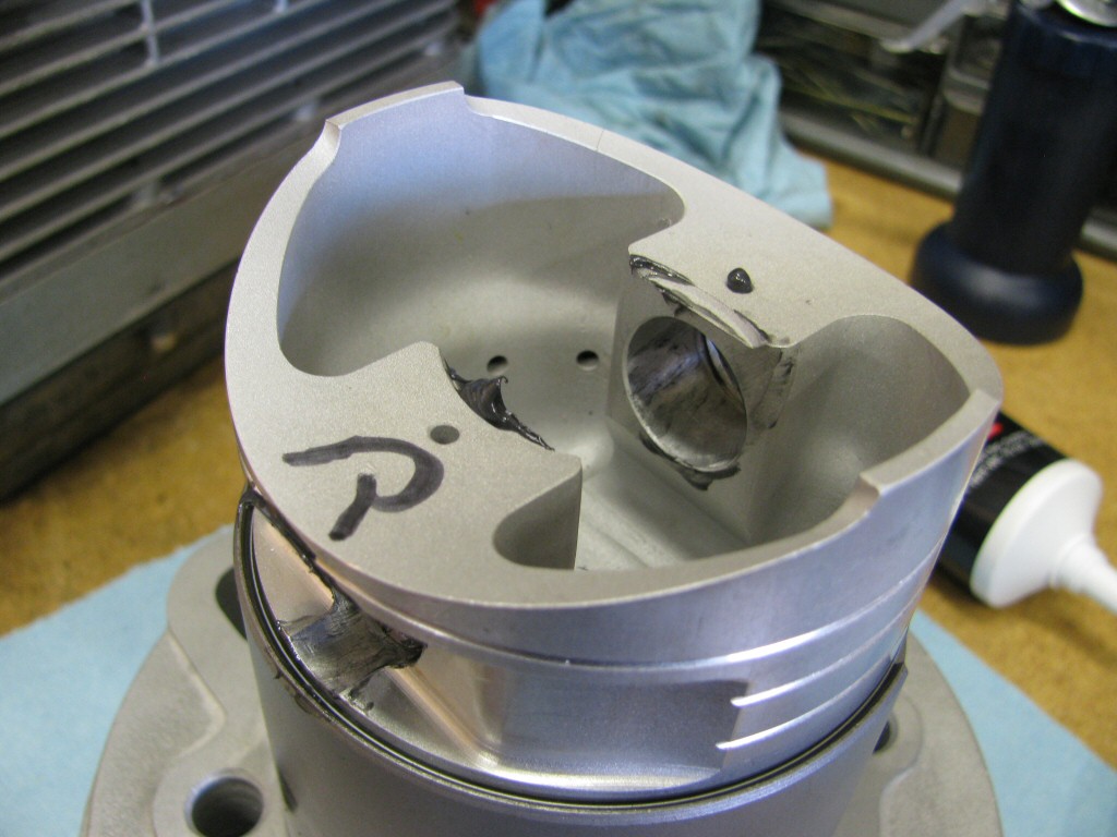 Assembly lube applied to the piston for the wrist pin.
