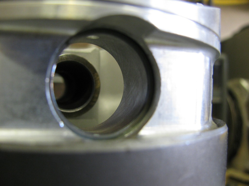 I fit a new circlip to one side of the piston.
