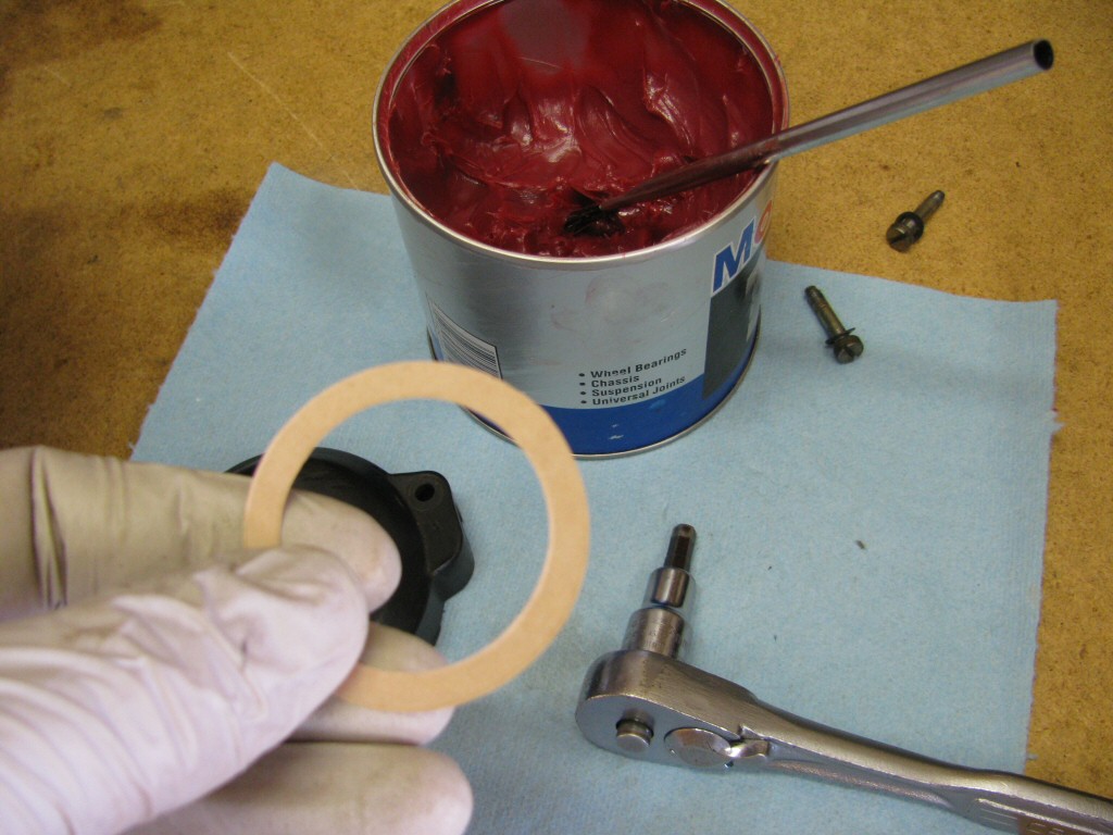 The gasket for the distributor gets coated with grease.
