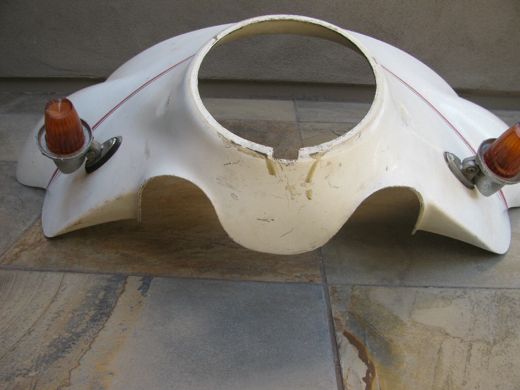 Moto Guzzi fairing (MG# 12575421). Lights are not original.