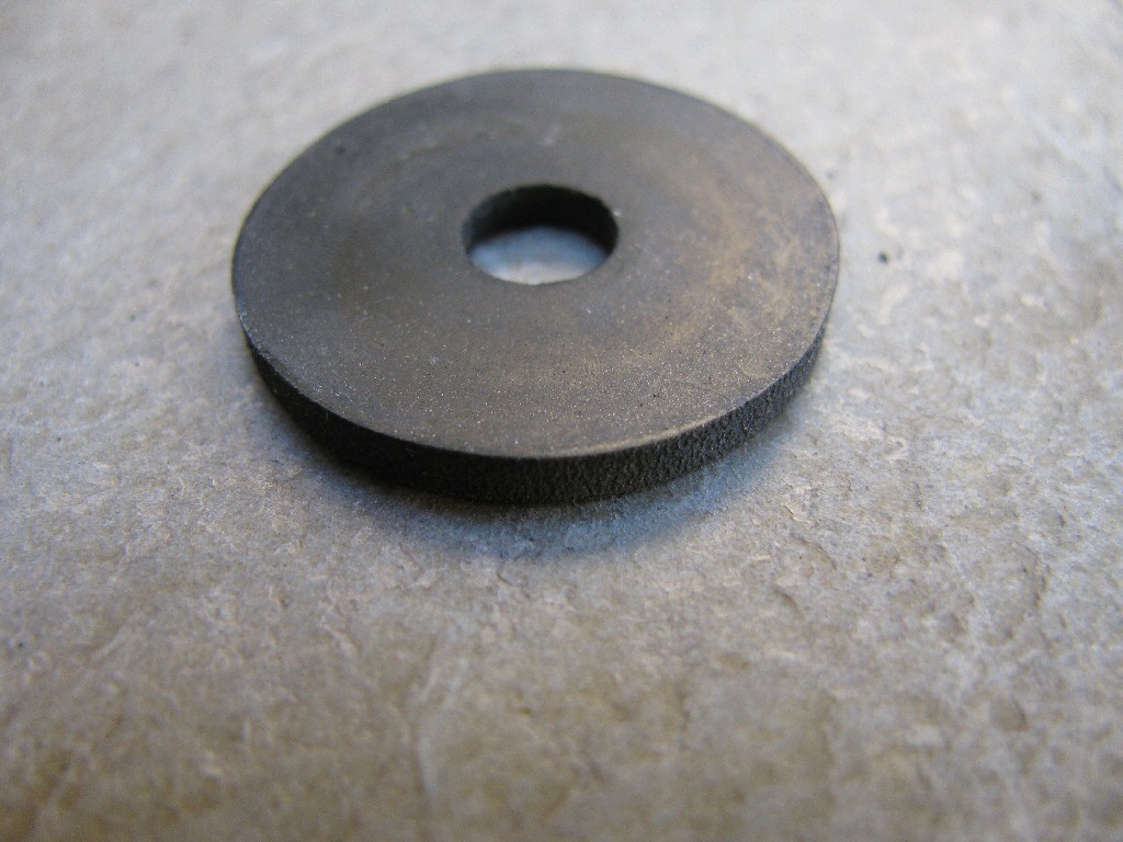 Large rubber washer (MG# 93110060).