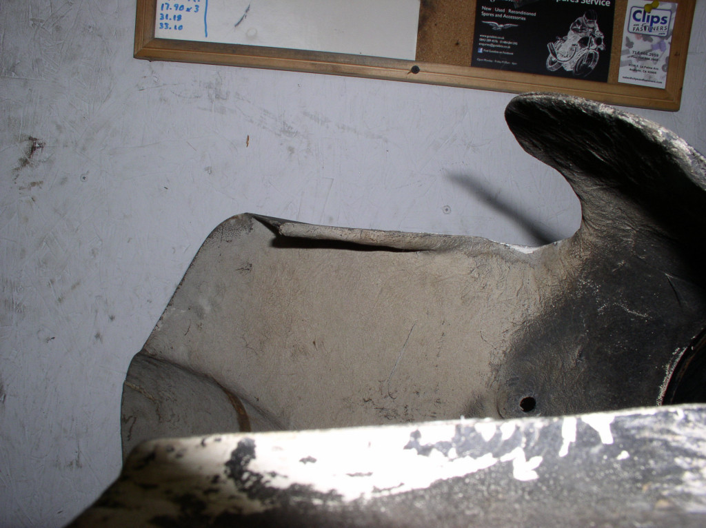 Early fairing: another view of the portion that fits under the headlight bucket and the horizontal side portion.