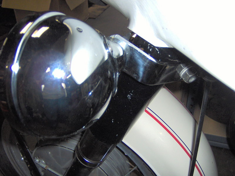 Close-up view of the mounting for the reproduction Harley Davidson FLH spot lights.