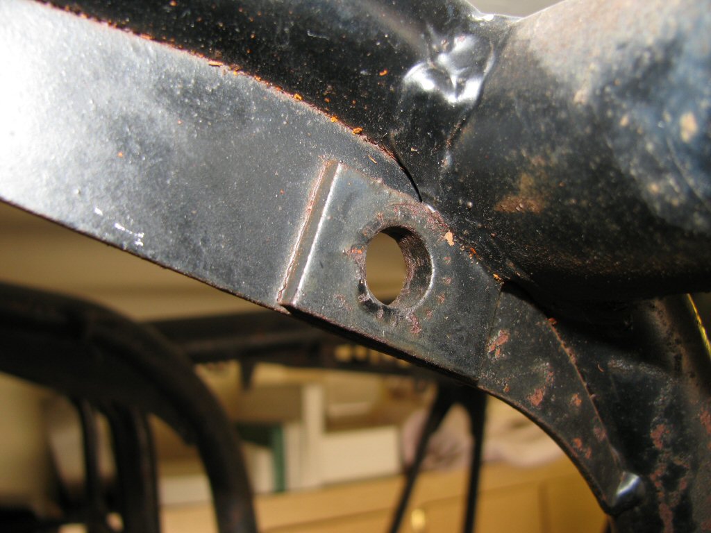 Fuel tank frame spacer.